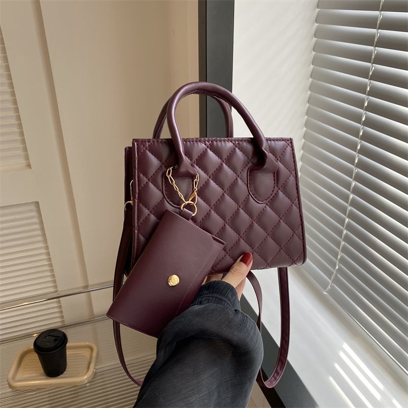 SQUARE PATTERNED SLING BAG